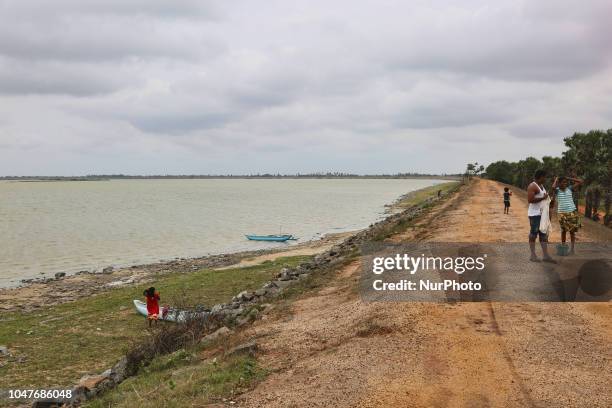 Giant's Tank in Mannar, Sri Lanka. The ancient Giant's Tank (Yodha Wewa in Sinhalese) is a large water irrigation tank that contains an Artificial lake. It is believed to have been built by King Dhatusena (459-477) and was later restored in the 1880s. The tank now covers over 4550 hectares ( 45.5 sq. km) and capable of carrying 31,500 acre feet ( 39 Mn cubic meters) of water. It supplies water to what is known as the 'rice bowl' of Sri Lanka. (Photo by Creative Touch Imaging Ltd./NurPhoto via Getty Images)